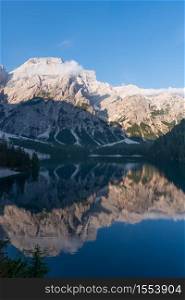 Mountain landscape reflected in the waters of Lake Braies, Italian Dolomites in South Tyrol