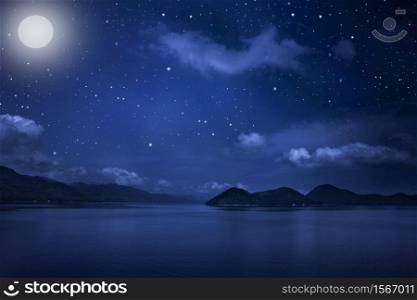 Mountain landscape view and Starry night sky with stars and moon in cloudscape background