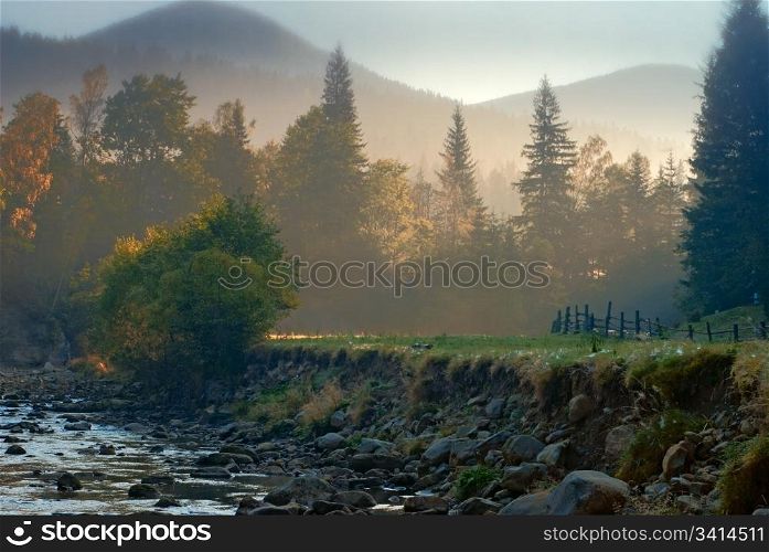 mountain landscape with riverbed in morning light. nature