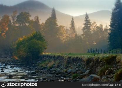 mountain landscape with riverbed in morning light. nature