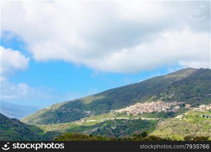 mountain landscape with Savoca village in Sicily in spring