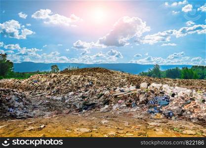 Mountain large garbage pile and pollution,Pile of stink and toxic residue,These garbage come from urban and industrial areas can not get rid of, Consumer society Cause massive waste