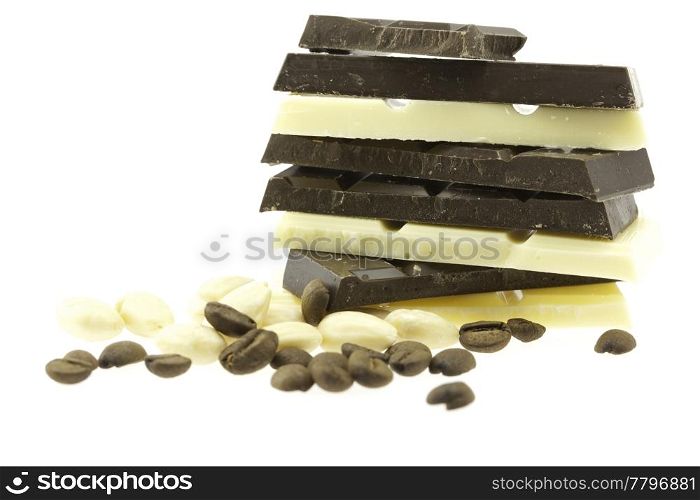 mountain of dark and white chocolate isolated on white