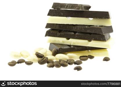 mountain of dark and white chocolate isolated on white