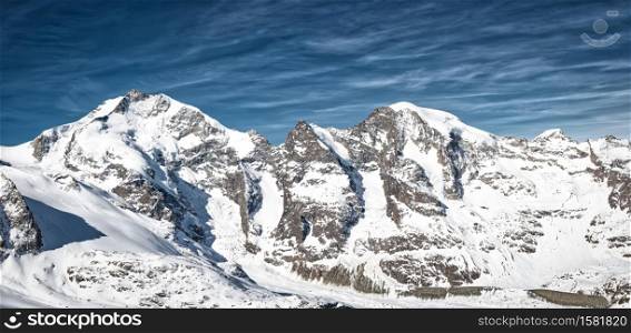 Mountain panorama of the Rhaetian Alps Piz Bernina and Piz Morteratsch in spring
