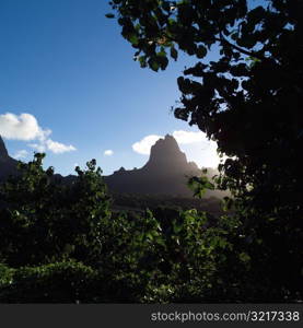 Mountain Peak against Blue Sky at Moorea in Tahiti