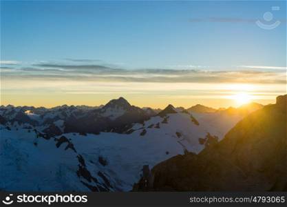 Mountain peak. Mountain landscape with snow and clear blue sky