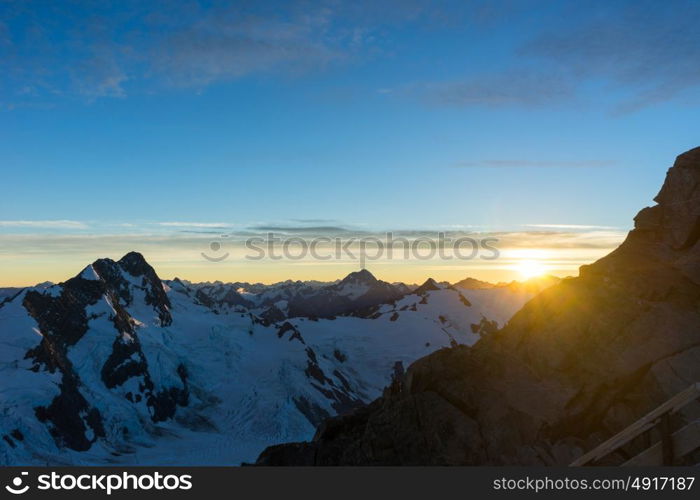 Mountain peak. Mountain landscape with snow and clear blue sky