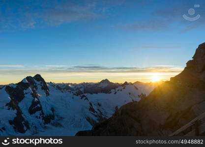 Mountain peak. Mountain landscape with snow and clear blue sky