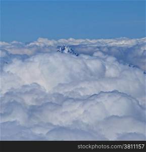 Mountain Peak. Peak of a 4000m Swiss mountain visable through the clouds