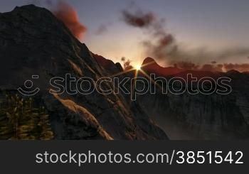 Mountain peaks at sunrise, helicopter view
