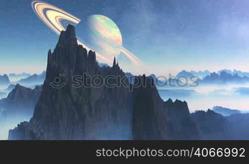 Mountain peaks rise above the dense fog, which lies in the lowlands. The starry night sky Saturn is surrounded by rings. Over the horizon a white fog. The camera flies over the mountains, the fog dissipates slowly. The sky visible nebula.