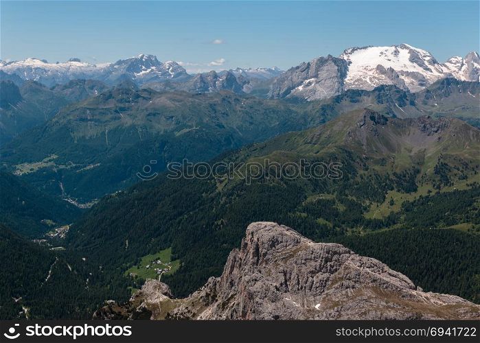 Mountain Ridge with Big Stone among Barren Mountains in Italian Dolomites Alps in Summer Time.. Mountain Ridge with Big Stone among Barren Mountains in Italian Dolomites Alps in Summer Time