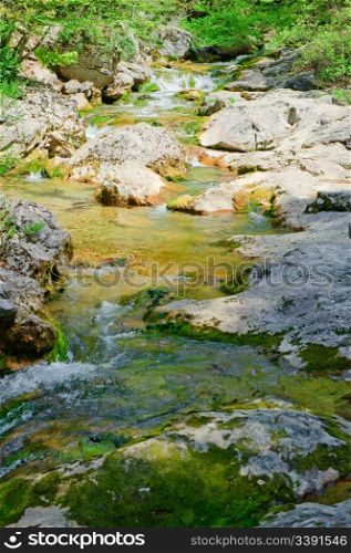 Mountain river. A stream of water in forest and mountain terrain. Crimea, the Grand Canyon.