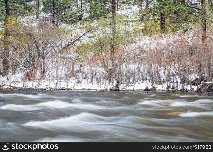 mountain river canyon in early spring - Poudre River in Rocky Mountains of northern Colorado