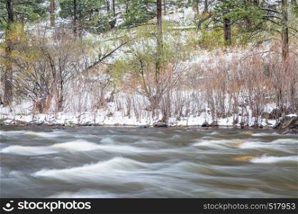 mountain river canyon in early spring - Poudre River in Rocky Mountains of northern Colorado