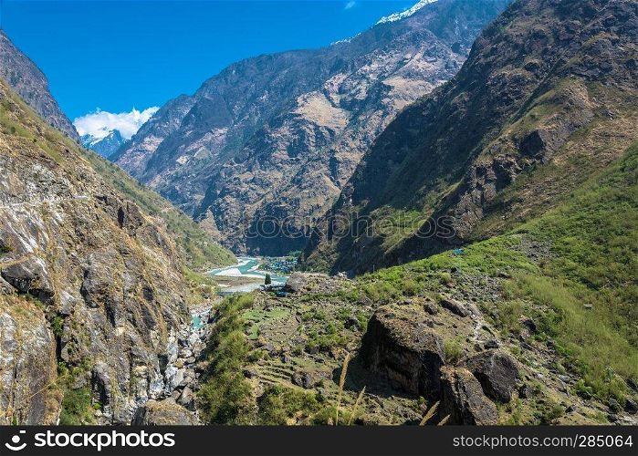Mountain river in a deep gorge on a spring day, Himalayas, Nepal.
