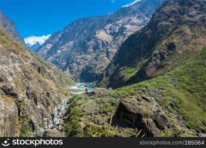 Mountain river in a deep gorge on a spring day, Himalayas, Nepal.