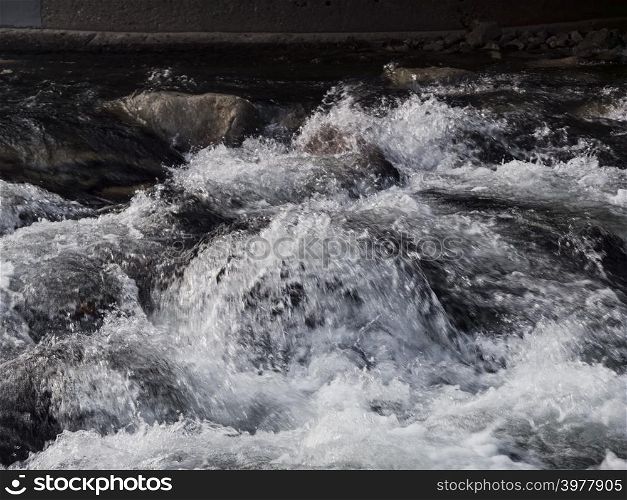 Mountain river. Water on river rapids, close-up.
