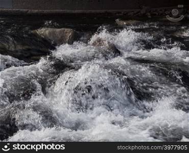Mountain river. Water on river rapids, close-up.