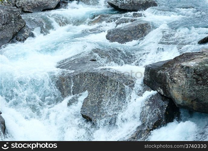 Mountain river waterfalls (Ottafossen, Norge ). Nature background.