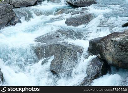 Mountain river waterfalls (Ottafossen, Norge ). Nature background.