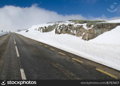 Mountain road with white snow.