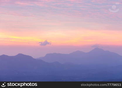mountain silhouette at sunrise in spring season