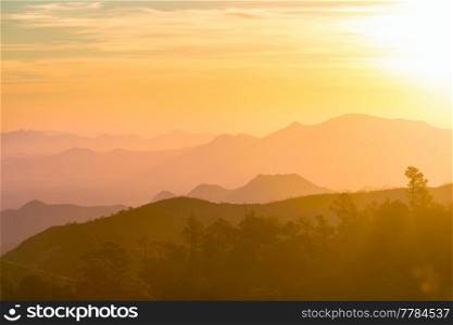 mountain silhouette at sunrise in spring season