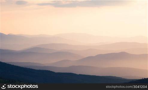 Mountain silhouettes. Mountain silhouettes. Sunrise mountain layers landscape panorama