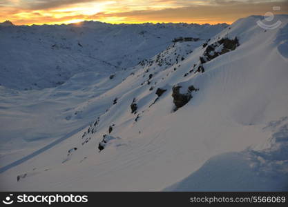 mountain snow fresh sunset at ski resort in france val thorens