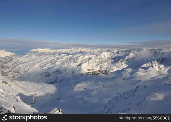 mountain snow fresh sunset at ski resort in france val thorens