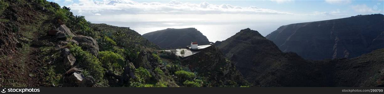 Mountain trail and church on the La Gomera island, Spain
