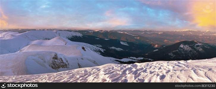Mountain twilight panorama with evening shadows from snowdrifts  Ukraine, Carpathian Mountains .