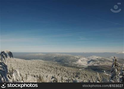 mountain view winter landscape with fresh snow, minimalistic scene at beautiful sunny day