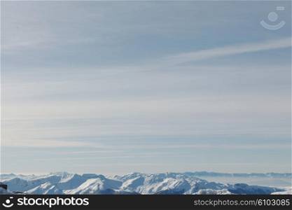 mountain view winter landscape with fresh snow, minimalistic scene at beautiful sunny day