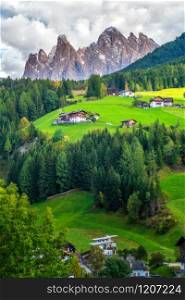 Mountain village in Villnoss with scenery of Geisler Mountain Group in Puez-Geisler Nature Park, the northwestern Dolomites Mountains, South Tyrol, northern Italy.