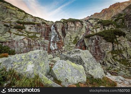 Mountain waterfall named Skok in High Tatra mountains, Slovakia, Europe. Waterfall mountain landscape