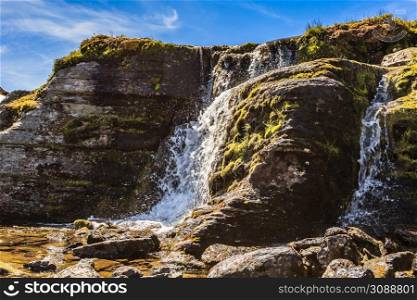 Mountain waterfall. Scenic region between Aurland and Laerdal in Norway. National tourist route Aurlandsfjellet.. Mountain waterfall, Aurlandsfjellet Norway