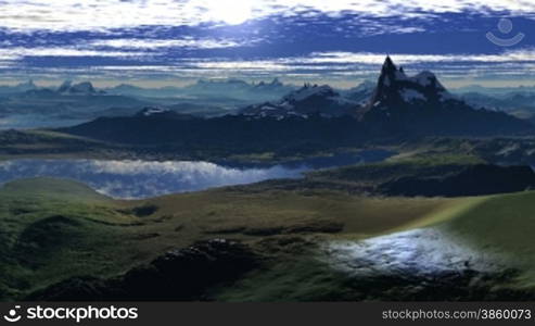 Mountain with sharp peaks covered with snow. Among the mountains and hills of the lake. They reflect the sky. Of - for the clouds appear bright sun and sits between two mountain peaks.