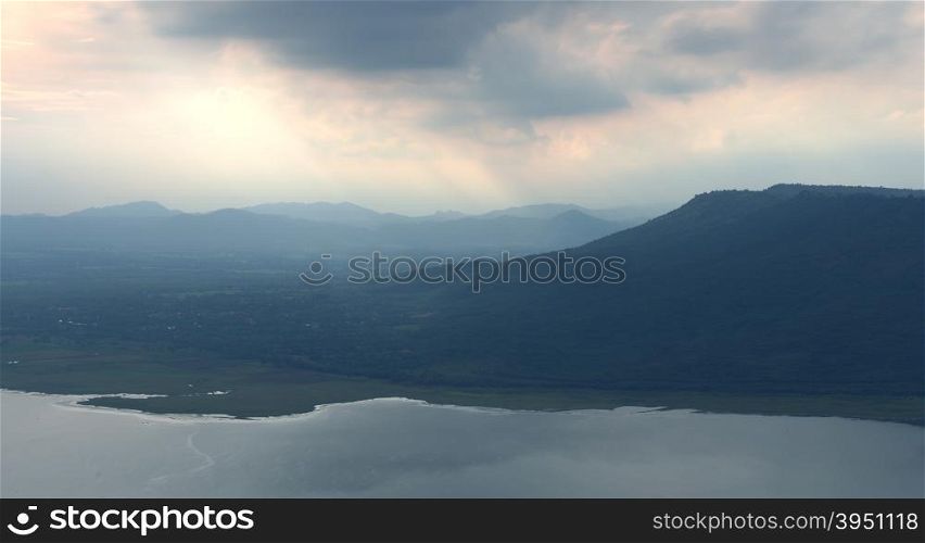 mountain with sunlight at Lam Takong reservoir dam, Nakhon Ratchasima, Thailand