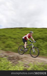 Mountainbiker Cycling Downhill