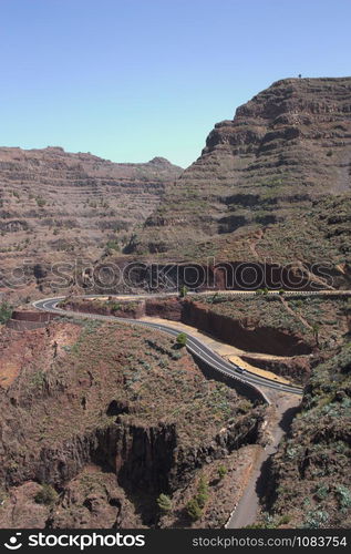 Mountainous landscape of the island of La Gomera, where you can see one of the main roads that connect the interior with the coast