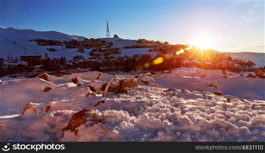 Mountainous village in sunset in wintertime, snowy hills, fresh air, scene destination, beautiful winter nature, cold weather in Faraya mountain