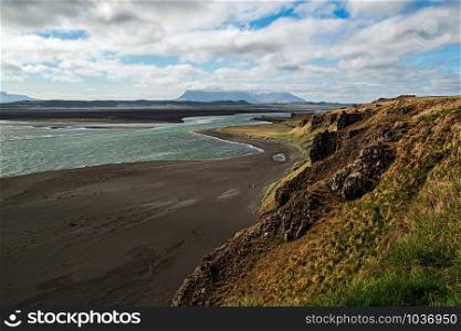 Mountains and black beach near Hvitserkur in Iceland in Vatnsnes peninsula. Mountains and black beach near Hvitserkur in Iceland