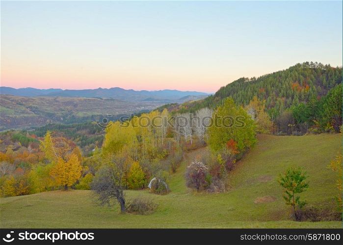 Mountains autumn landscape with colorful forest