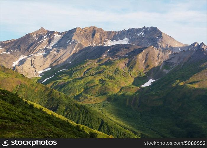 Mountains in Alaska. Picturesque Mountains of Alaska in summer. Snow covered massifs, glaciers and rocky peaks.