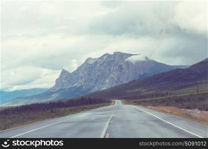 Mountains in Alaska. Picturesque Mountains of Alaska in summer. Snow covered massifs, glaciers and rocky peaks.
