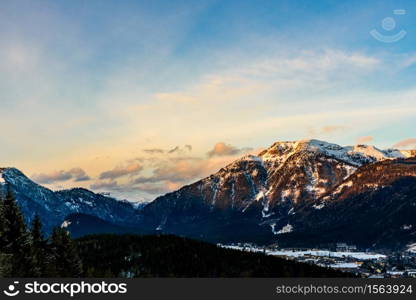 Mountains in, Styria, Austria Bad Mitterndorf View on a snowy terrains surrounding resorts. Mountains in Styria Bad Mitterndorf Alps sunset