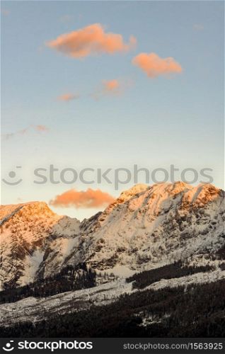 Mountains in, Styria, Austria Bad Mitterndorf View on a snowy terrains surrounding resorts. Mountains in Styria Bad Mitterndorf Alps sunset